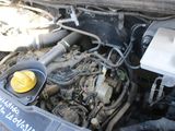 a picture of a car engine with its hood open