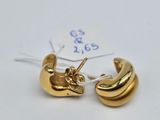 two gold plated earrings on a white background with a price tag