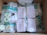 a box full of diapers and other items in it