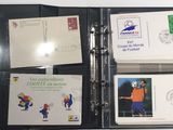a binder that has a bunch of postcards inside of it