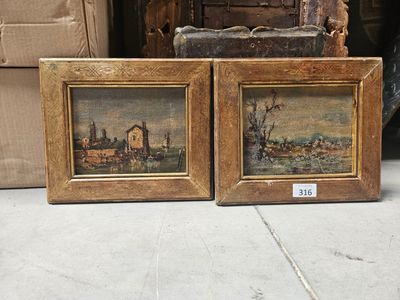 two paintings on the floor next to each other