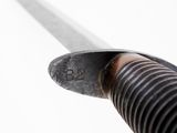 a close up of a knife with a blade on it