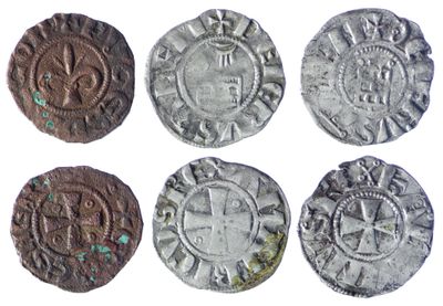 six types de pièces différents sont présentés sur une surface blanche