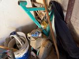 a pile of items that are sitting in the corner of a room