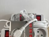 an image of a group of power cords plugged into a power strip