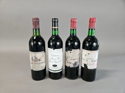 trois bouteilles de vin sont alignées sur une table