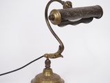 a close up of a lamp on a white surface with a white background