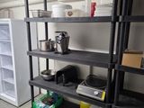 a shelf that has a lot of items on it