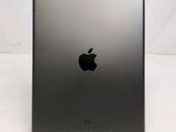 a close up of the back of an ipad on a white surface
