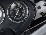 steering wheel of a car with gauges and speedometers on it
