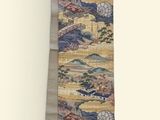 an image of a tie hanging on a wall