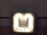 a light that is on in the corner of a room