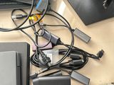 a lot of electronics that are sitting on a desk