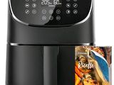 un gros plan d'une friteuse à air chaud sur laquelle est posé un magazine
