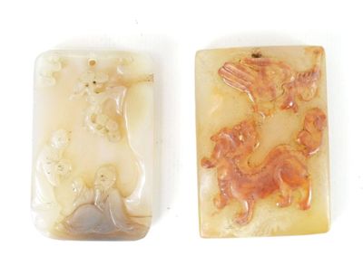two soap bars with a picture of a woman and a horse on them