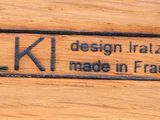 a close up of a wooden box with a label on it