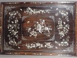 a picture of a wooden box with flowers and birds on it