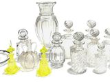 a lot of glass items that are sitting on a table