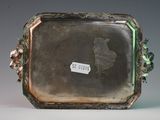a picture of a silver tray with a picture on it