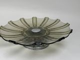 a glass bowl that is sitting on a table