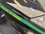 a close up of a motorcycle with a sticker on it