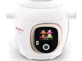 an image of a white rice cooker sitting on top of a counter