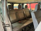 the interior of a van with two rows of seats in it