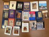 a lot of books that are on the table