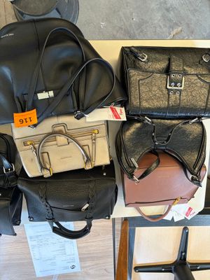 a lot of bags that are sitting on a table