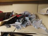 a pile of assorted items sitting on a desk