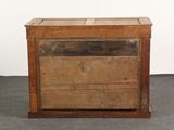 an old wooden chest with two drawers on it
