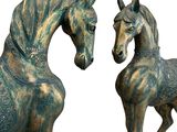 statue of a horse and a foal standing next to each other