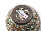 an image of a vase with a tag on it