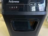 a black paper shredder sitting on a table