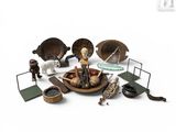 un grand nombre d'objets posés sur une surface blanche
