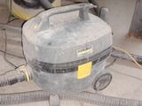 an image of a wet dryer and other equipment in a garage