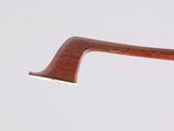 a close up of a pair of glasses with a wooden handle