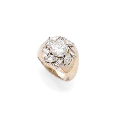 a diamond and gold ring, by van cleef