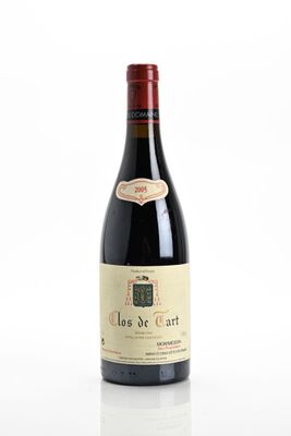 a bottle of wine that is sitting on a table
