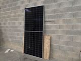 an image of a room with a solar panel on the wall