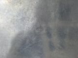 a close up of a metal object with a blurry background