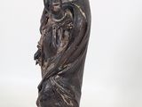 statue of a woman holding a bird on a white background