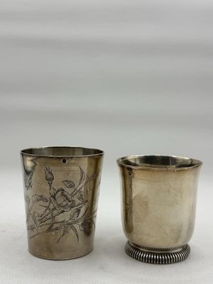 pair of antique silverplated shot glasses with birds on them