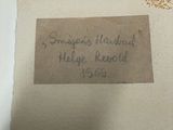 a piece of paper with writing on it on the floor
