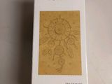 an image of a box of perfume sitting on a table