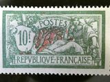 un timbre sur lequel figure l'image d'un homme à cheval