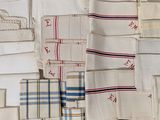 many different types of cloths laid out on a table