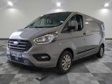 the new ford transit van is parked on a checkered floor