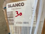 a box with a price tag on it sitting on the ground