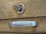 a close up of a drawer with a lock on it
